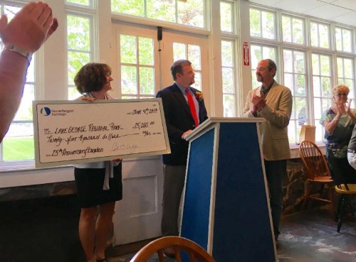 Skowhegan team presenting a check for Lake George Reserve